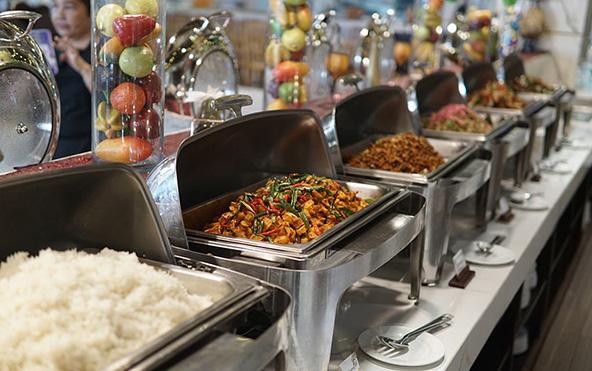 Premium special occasion catering buffet — chafing dishes with Bengali, multi-cuisine, and themed dishes by Parsha Caterer Kolkata