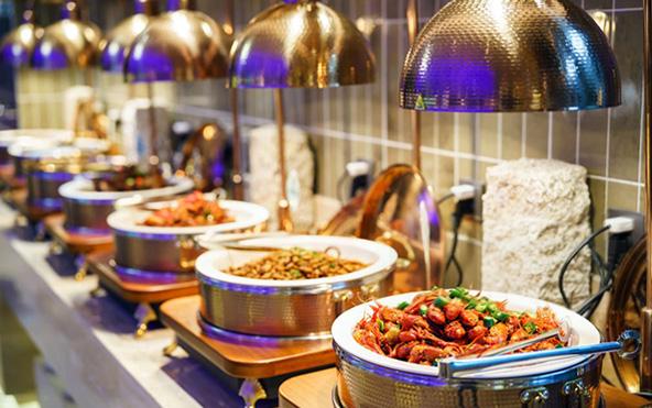 Elegant special occasion buffet line with curries, rice, and starters — Parsha Caterer Kolkata