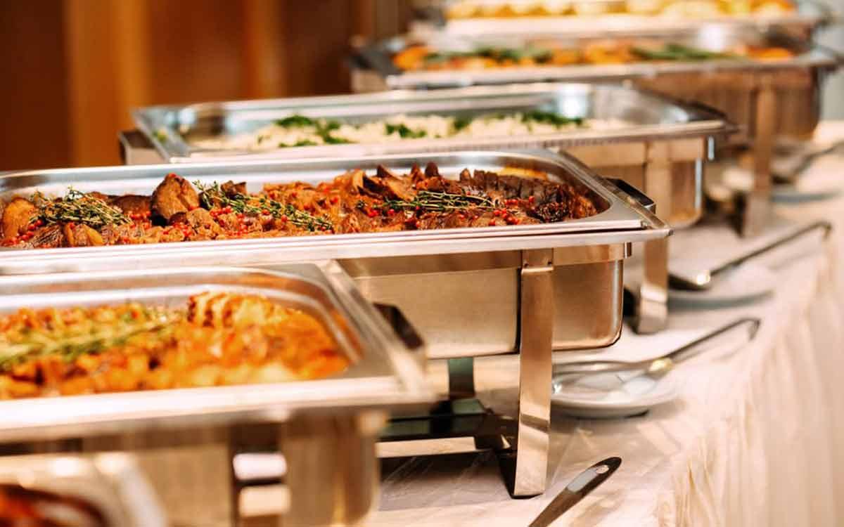 Premium chafing-dish buffet for a birthday party in Kolkata with kebabs, curries, and rice — Parsha Caterer